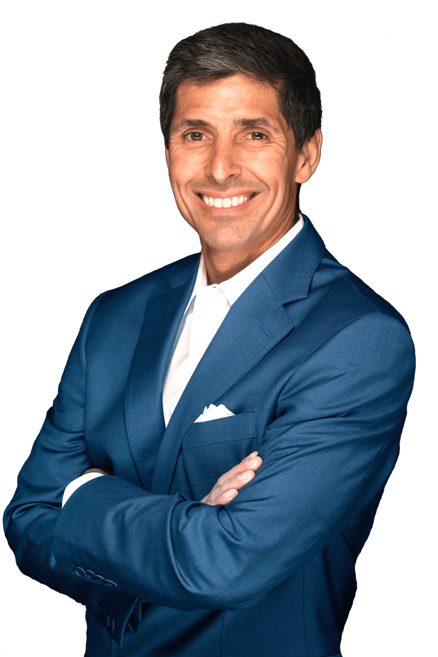 Michael Santos smiling in a blue jacket